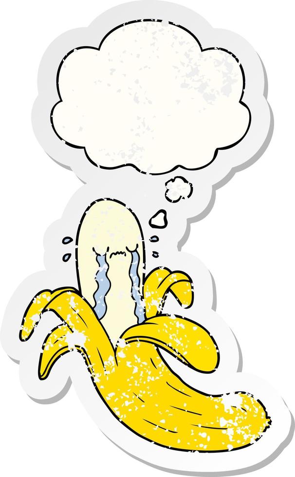 cartoon crying banana and thought bubble as a distressed worn sticker vector