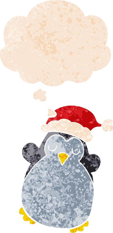 cute christmas penguin and thought bubble in retro textured style vector