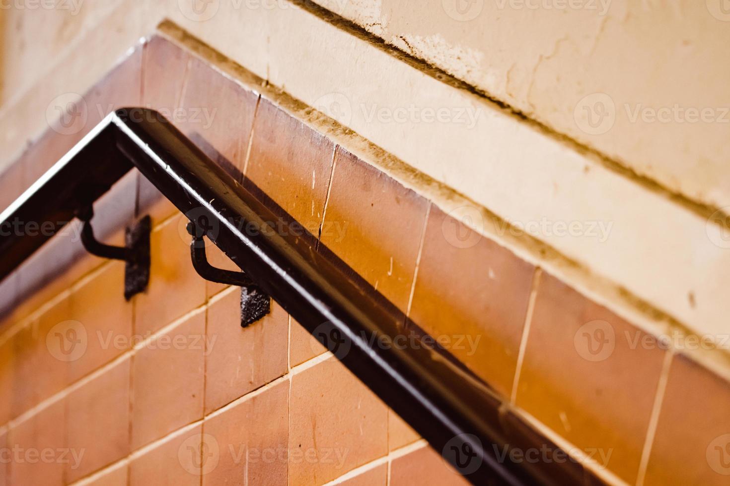 old railing at a train station photo