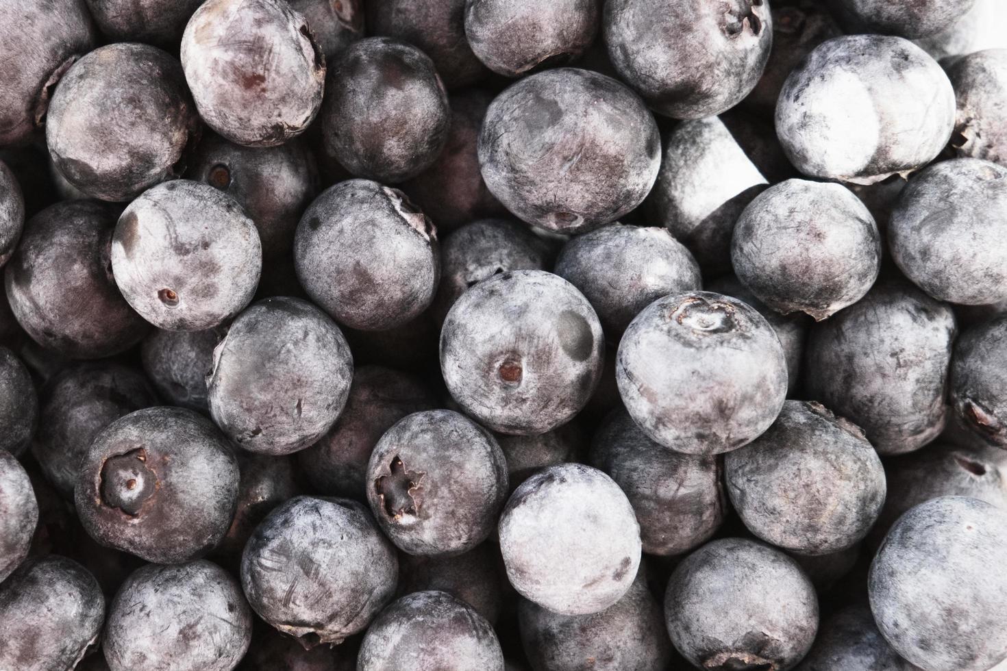 diet natural blueberries in the basket, top view, ripe blue berries on the market stall, group of purple eco berry, organic nutrition, food background photo