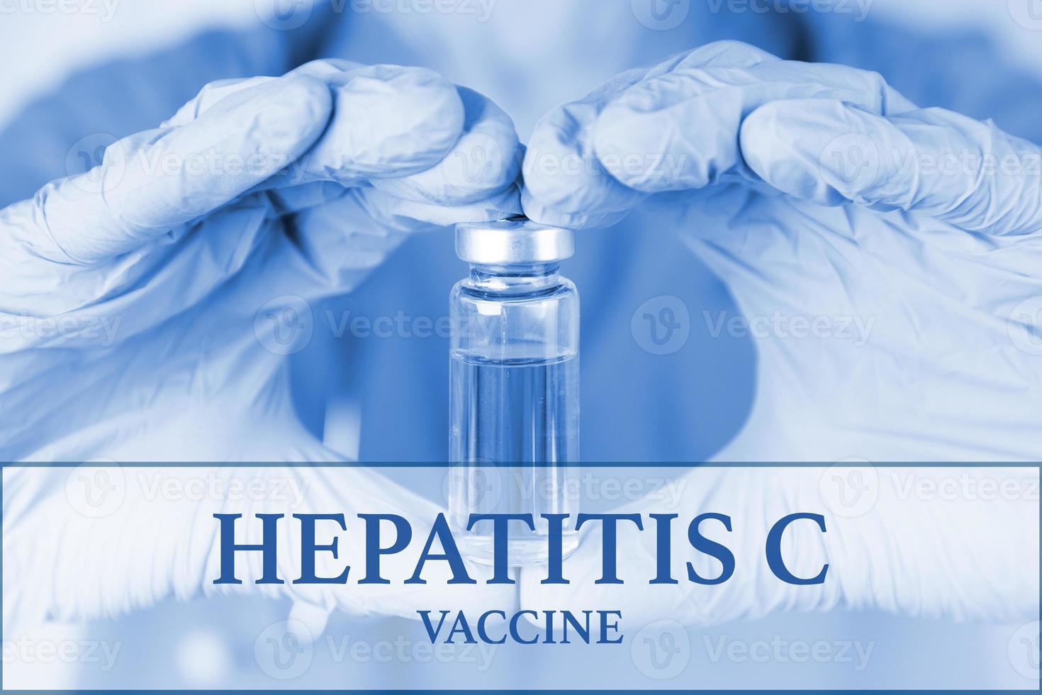 Hepatitis C vaccine. medical ampoule in the hands of a doctor. Vaccination awareness concept. Toned image. Soft blurred background. Medical poster. photo