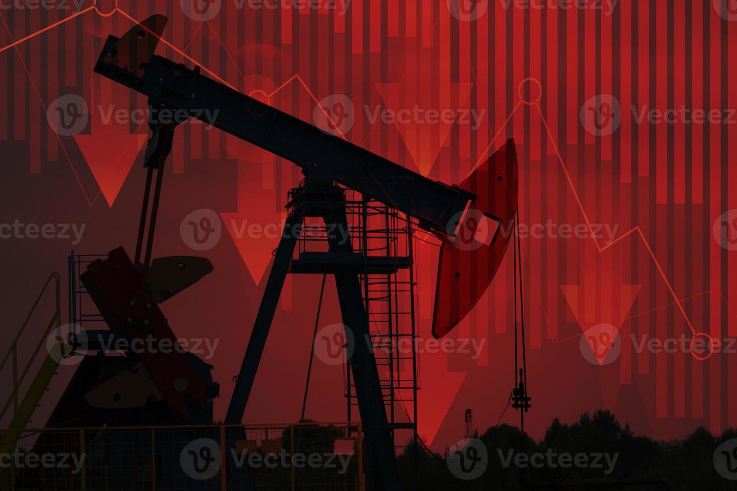 Falling oil prices. The arrow on the chart goes down. Crisis crude oil market. Reducing the cost of hydrocarbons. Oil pump, drilling rig in the background. Oil market forecast. photo