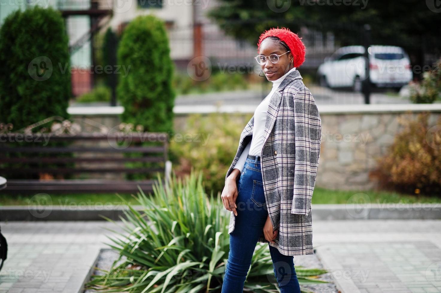 Young modern fashionable, attractive, tall and slim african muslim woman in hijab or turban head scarf posed. photo