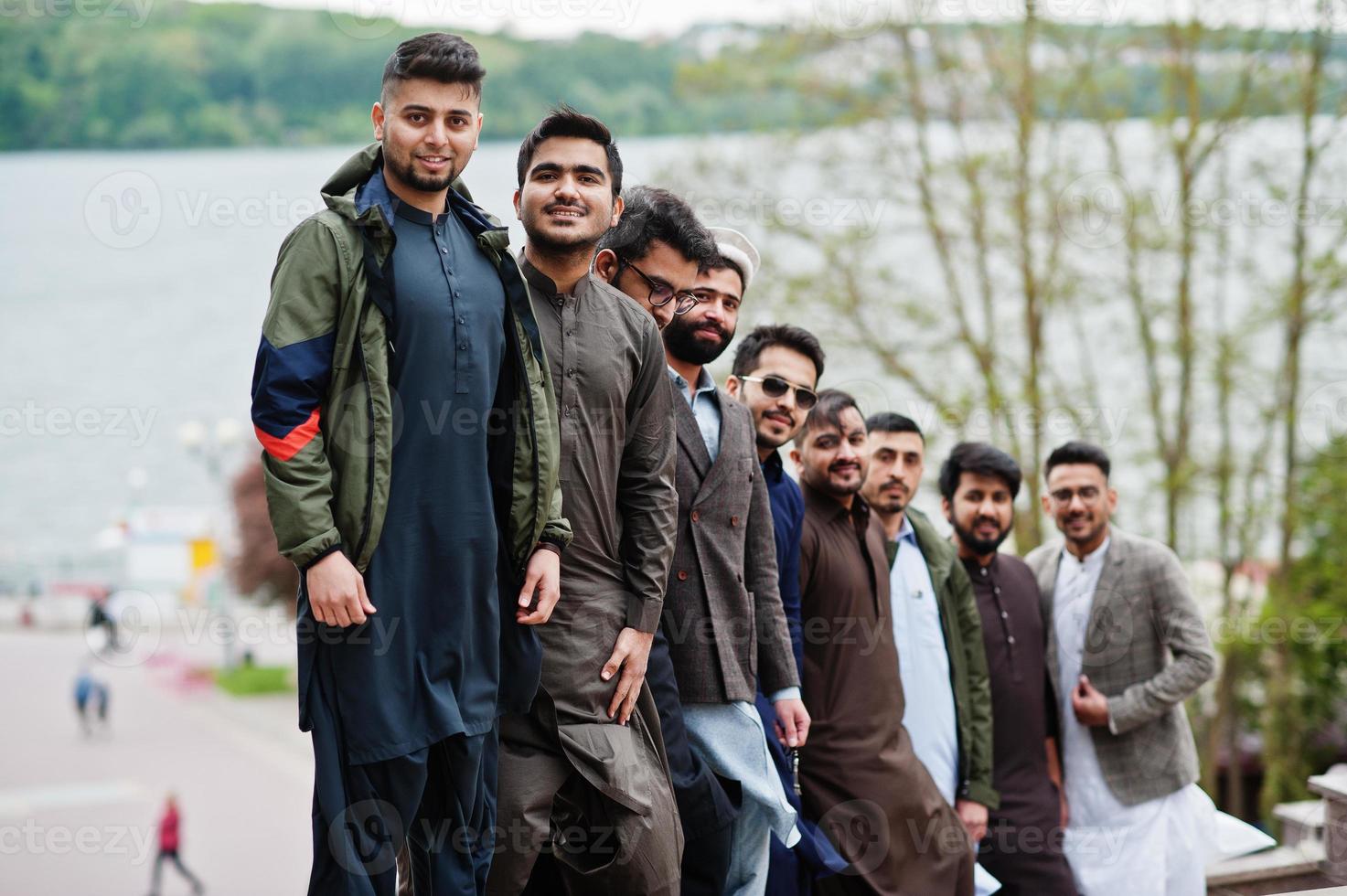 Group of pakistani man wearing traditional clothes salwar kameez or kurta. photo