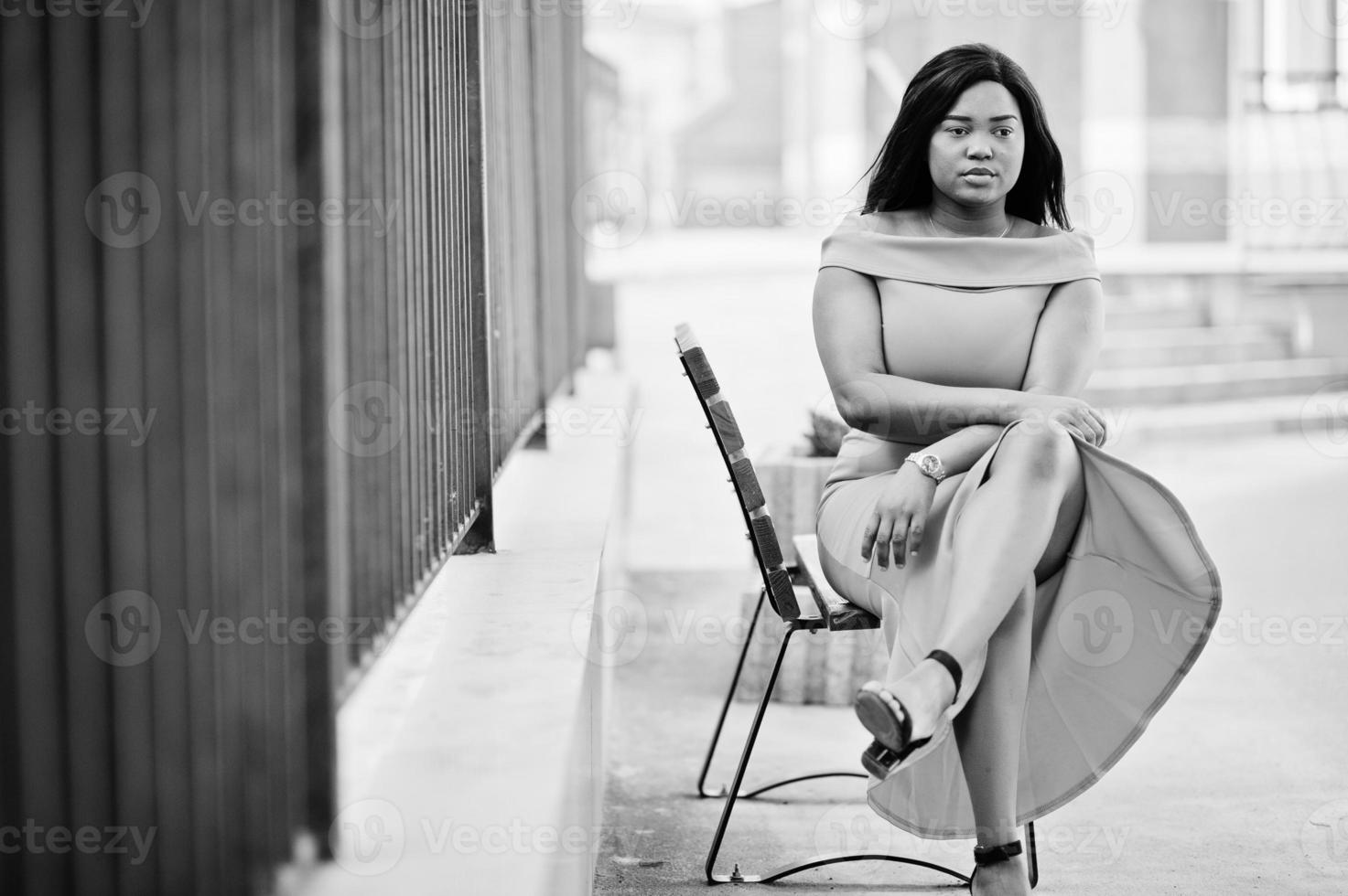 African american woman model xxl in orange dress. photo