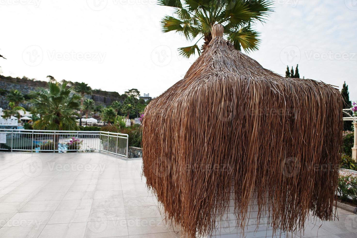 Relaxation straw spa hut zone at Turkey resort. photo
