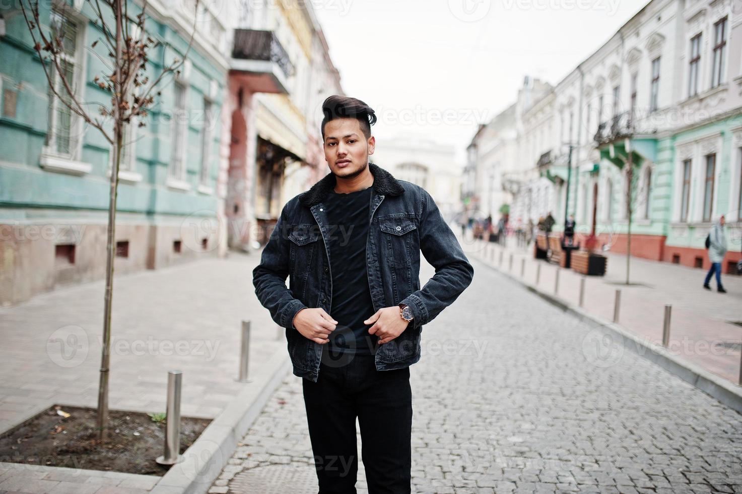 https://static.vecteezy.com/system/resources/previews/010/490/758/non_2x/handsome-and-fashionable-indian-man-in-black-jeans-jacket-posed-outdoor-photo.jpg