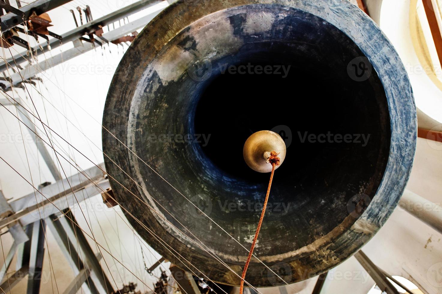 Close-up view of metal orthodox church bells in tower. photo