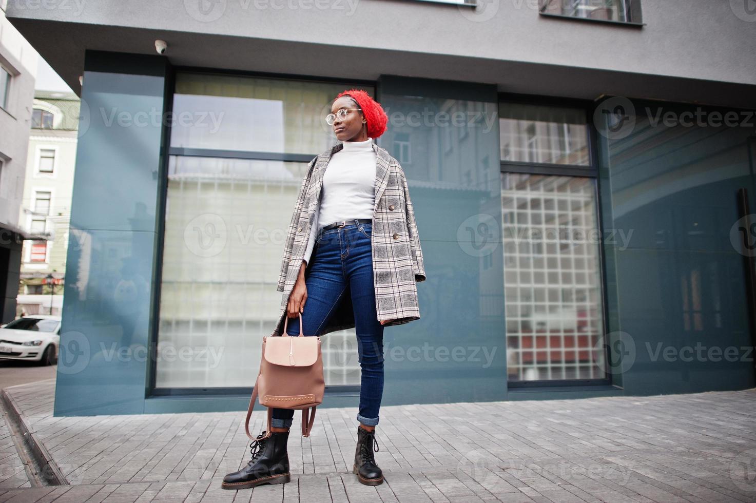 Young modern fashionable, attractive, tall and slim african muslim woman in hijab or turban head scarf posed. photo