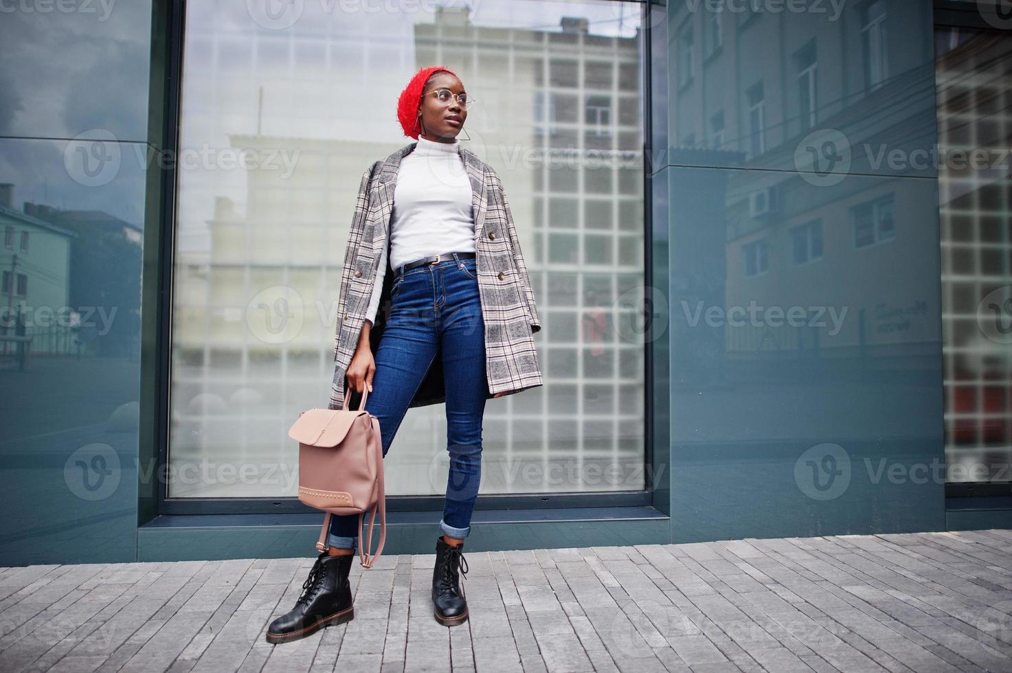 Young modern fashionable, attractive, tall and slim african muslim woman in hijab or turban head scarf posed. photo