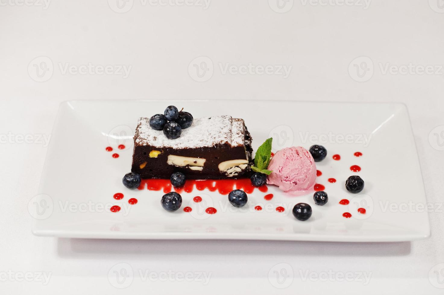 View on white background of cake with ice cream. Healthy food, diet lunch concept. photo