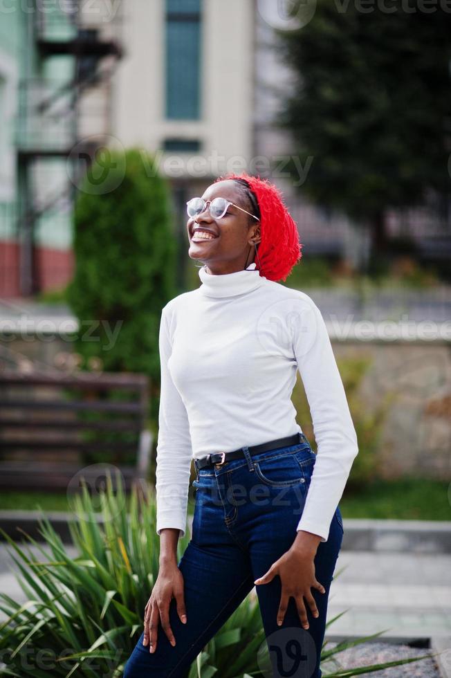 Young modern fashionable, attractive, tall and slim african muslim woman in hijab or turban head scarf posed. photo