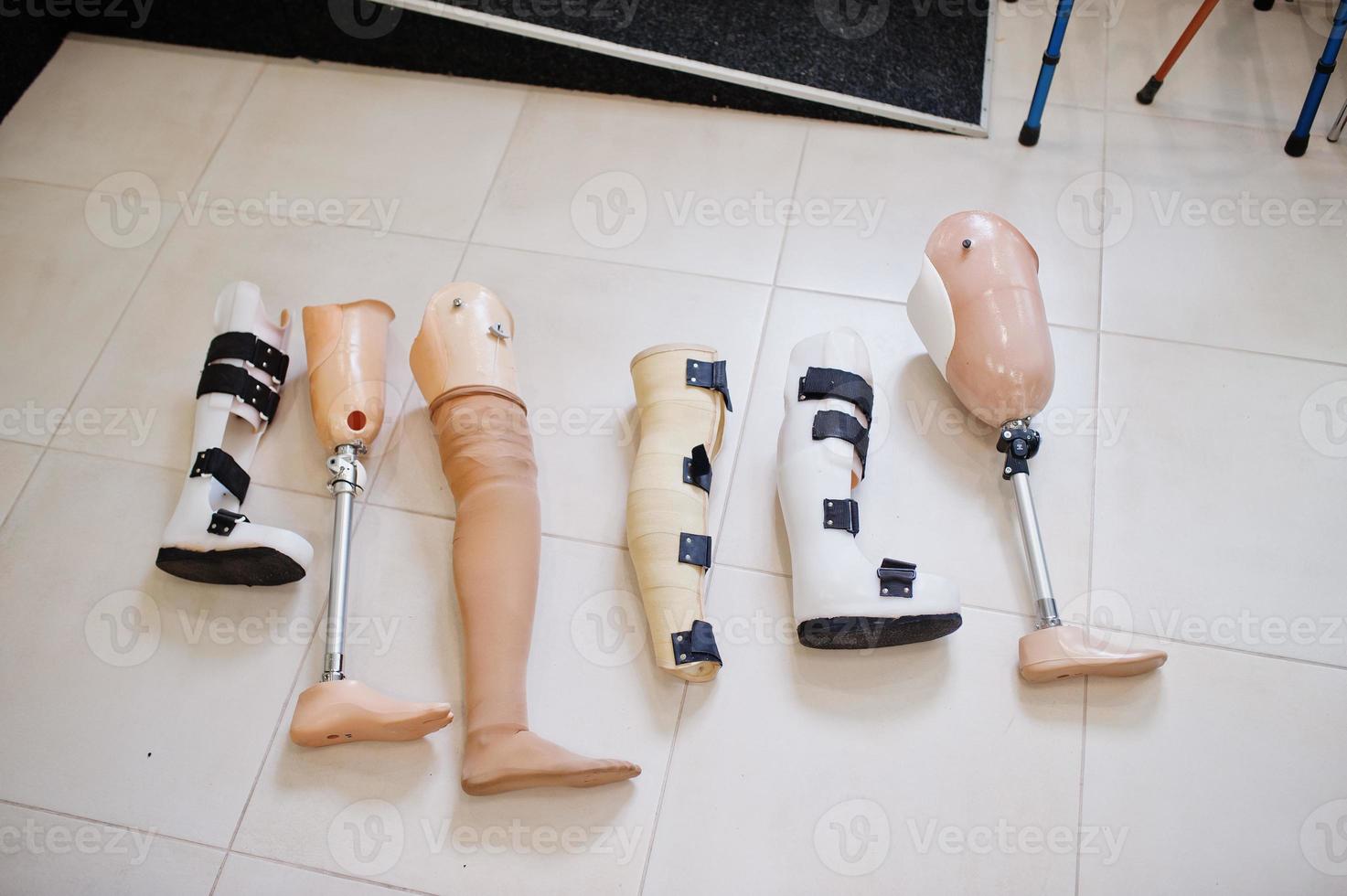 Six prosthetic leg at prosthetist clinic. photo