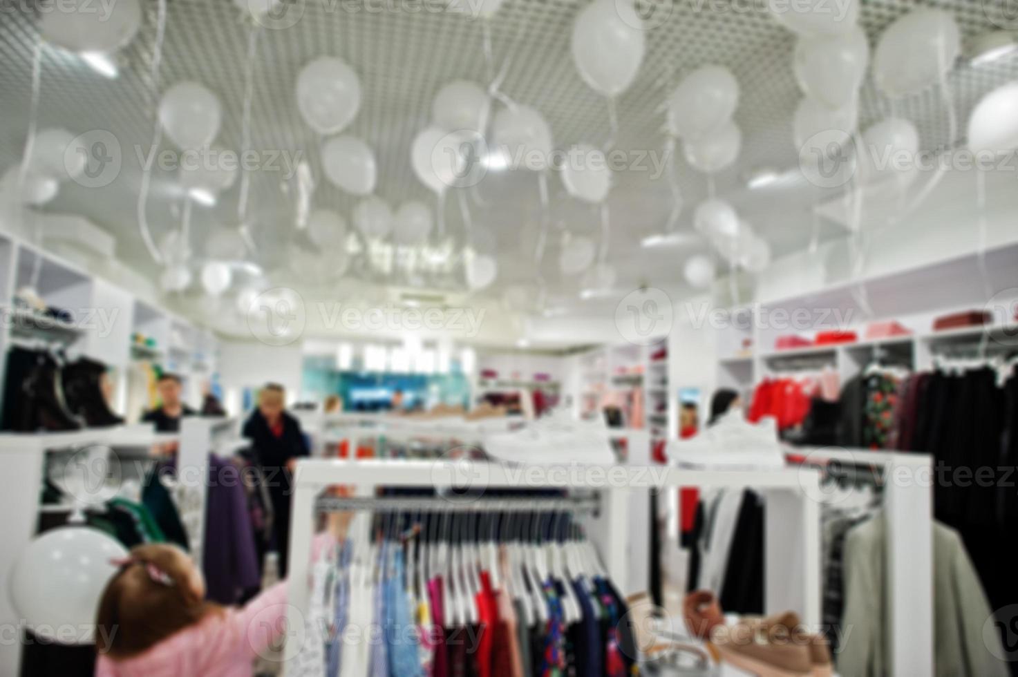 Blurred or defocused background of clothing store boutique. photo