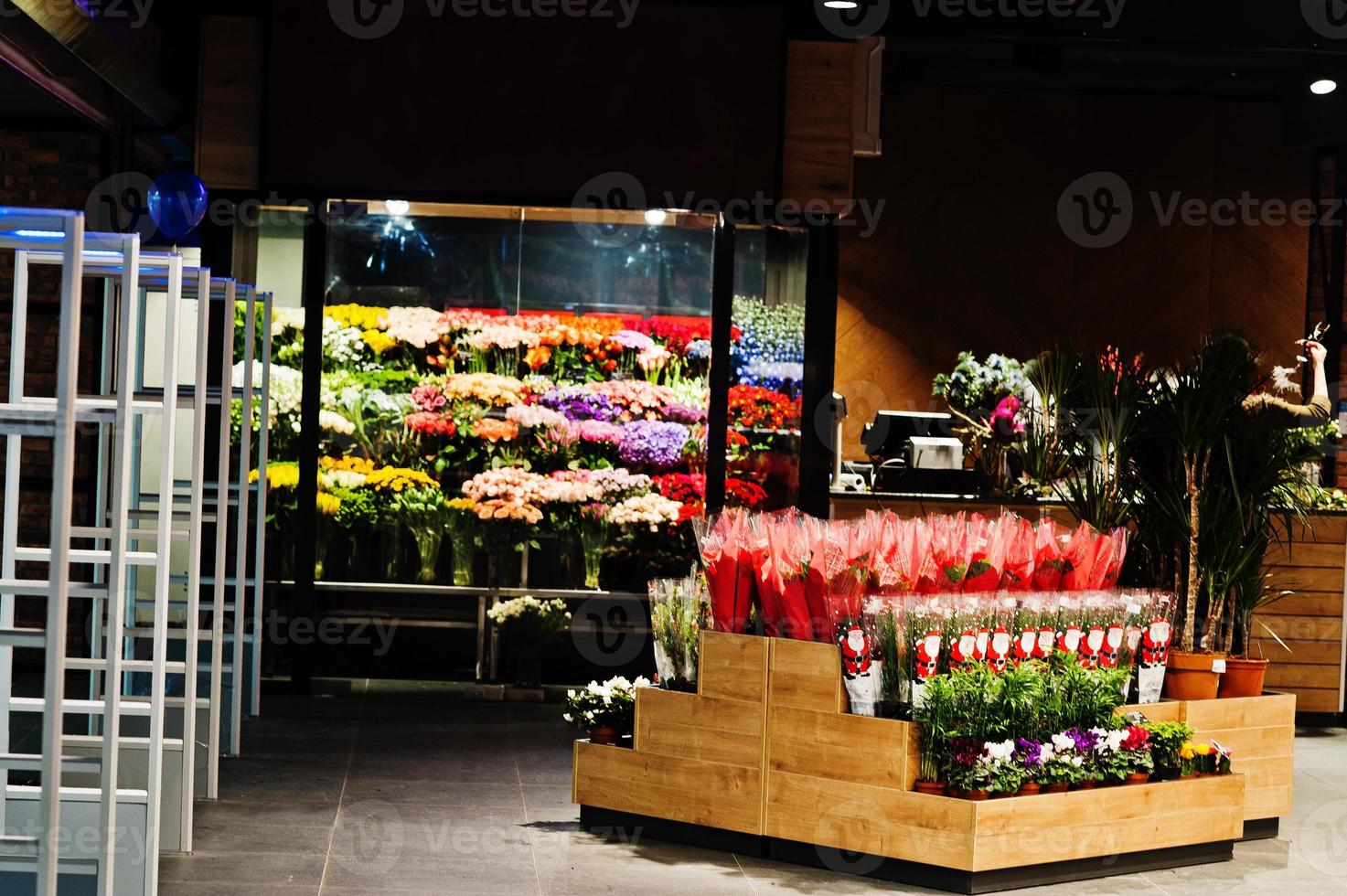 Fllower shop with colourful flowers at supermaket. photo