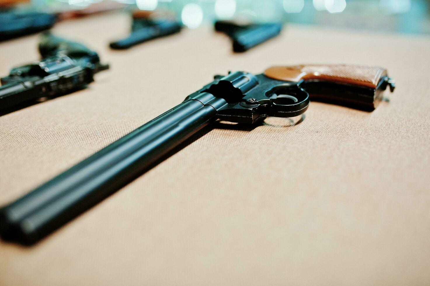 Close up revolvers guns on shooting range. photo