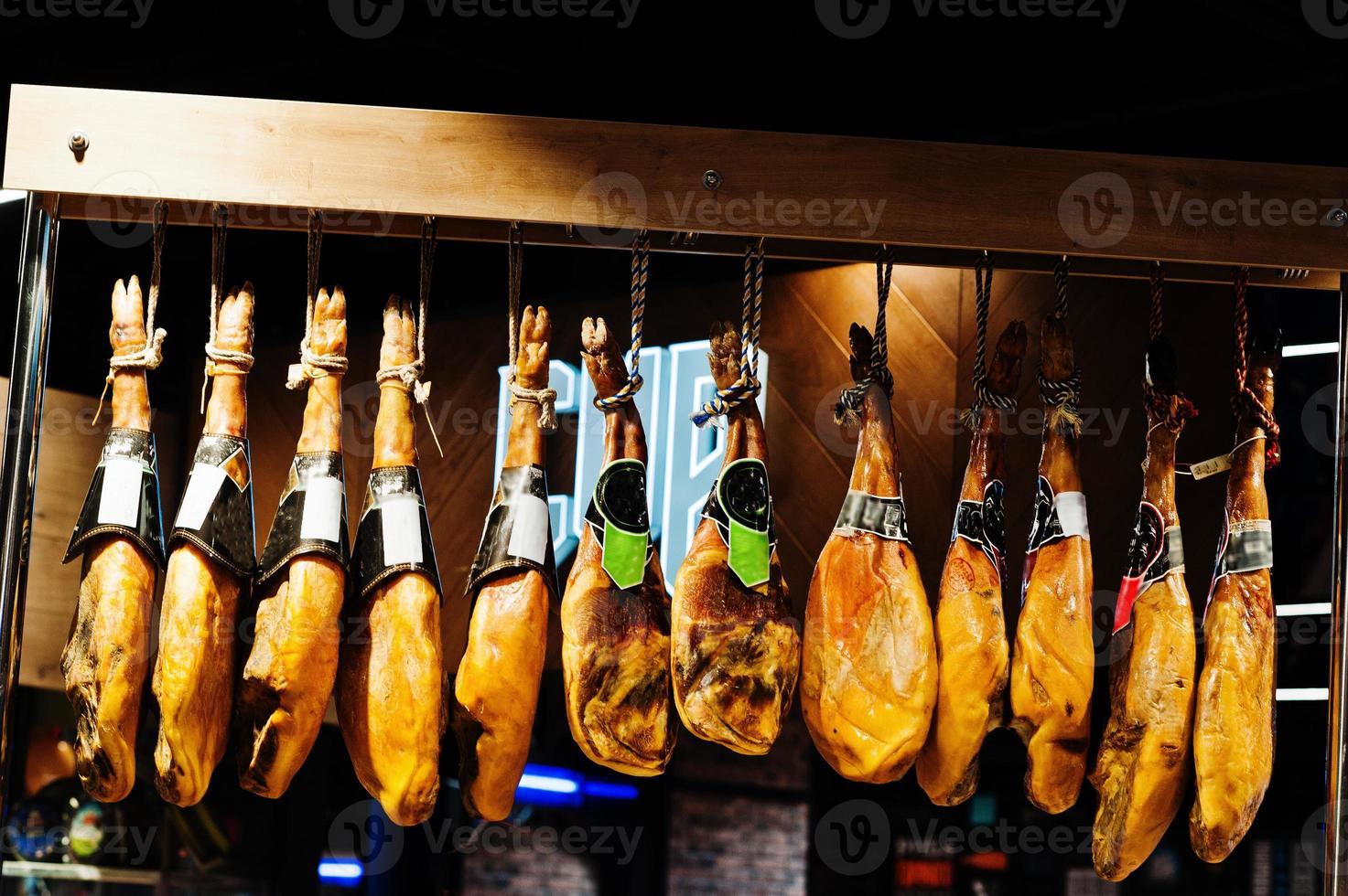 Traditional spanish jamon ham for sale at supermarket. photo