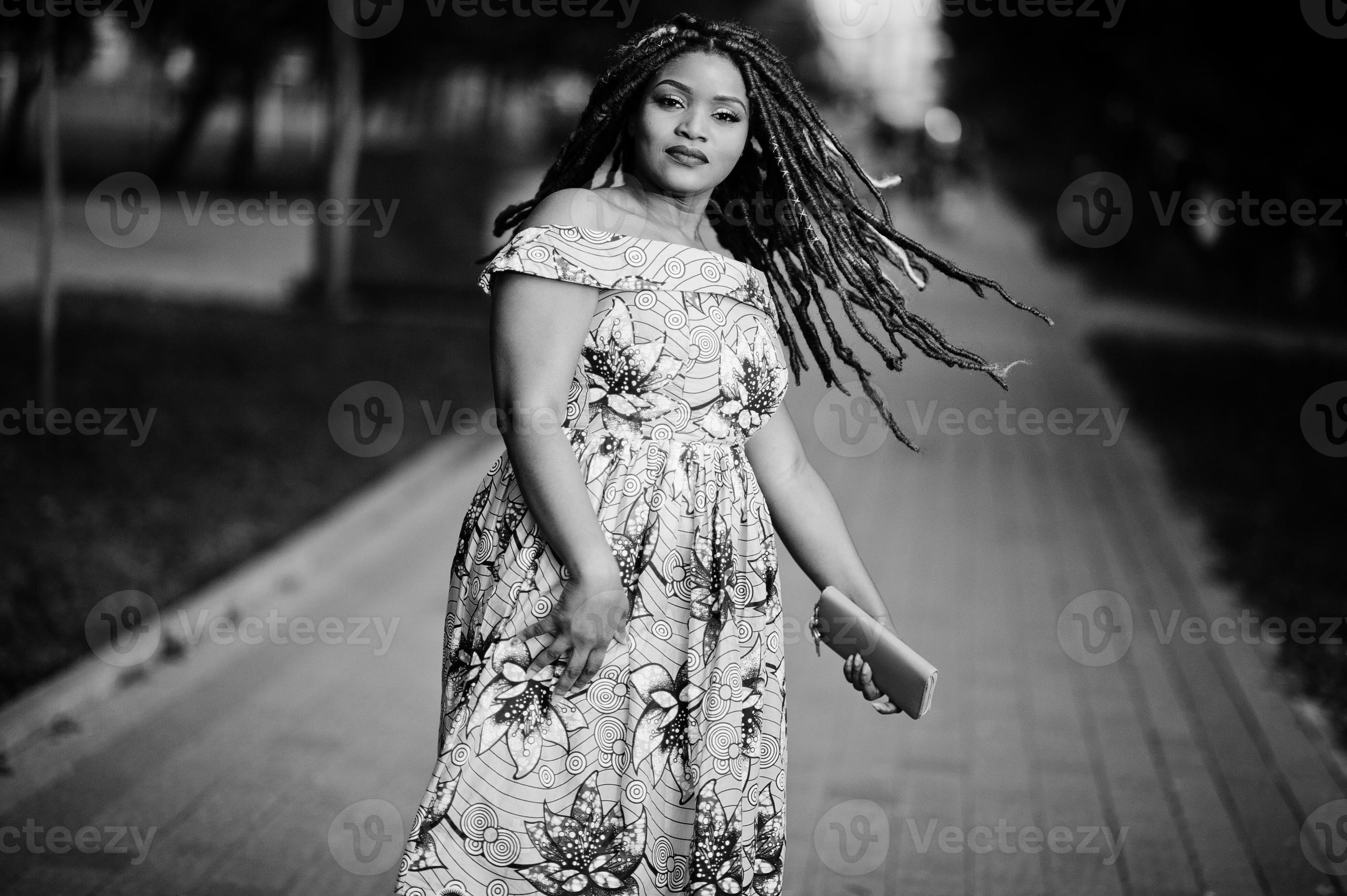 Cute small height african american girl with dreadlocks, wear at