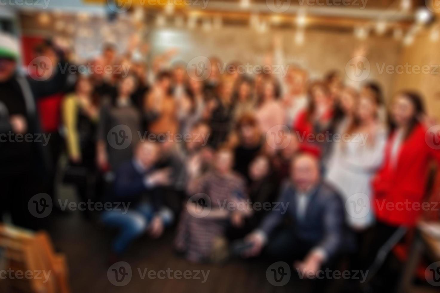 Master class and study concept. Abstract blurred group photo of peoples from conference or seminar room.