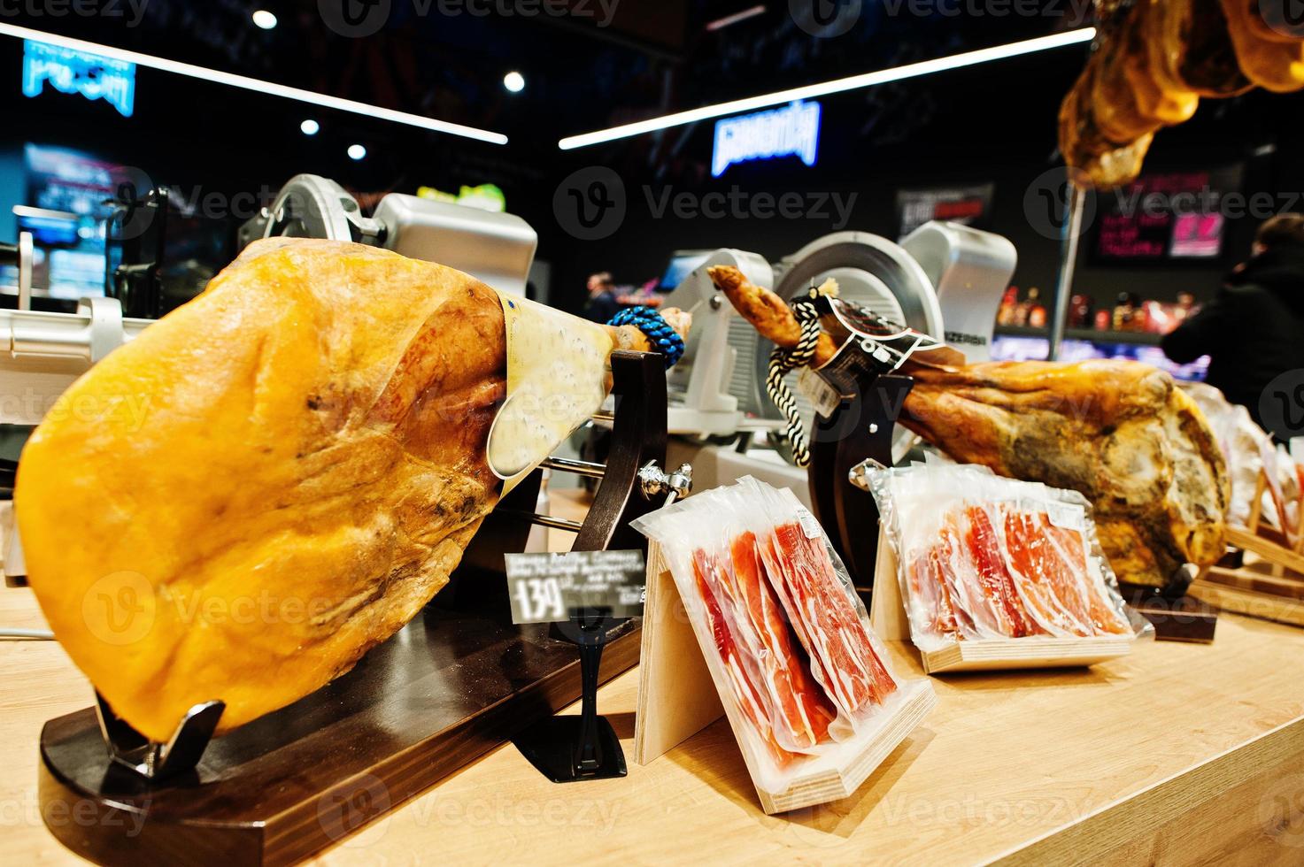 Traditional spanish jamon ham for sale at supermarket. photo