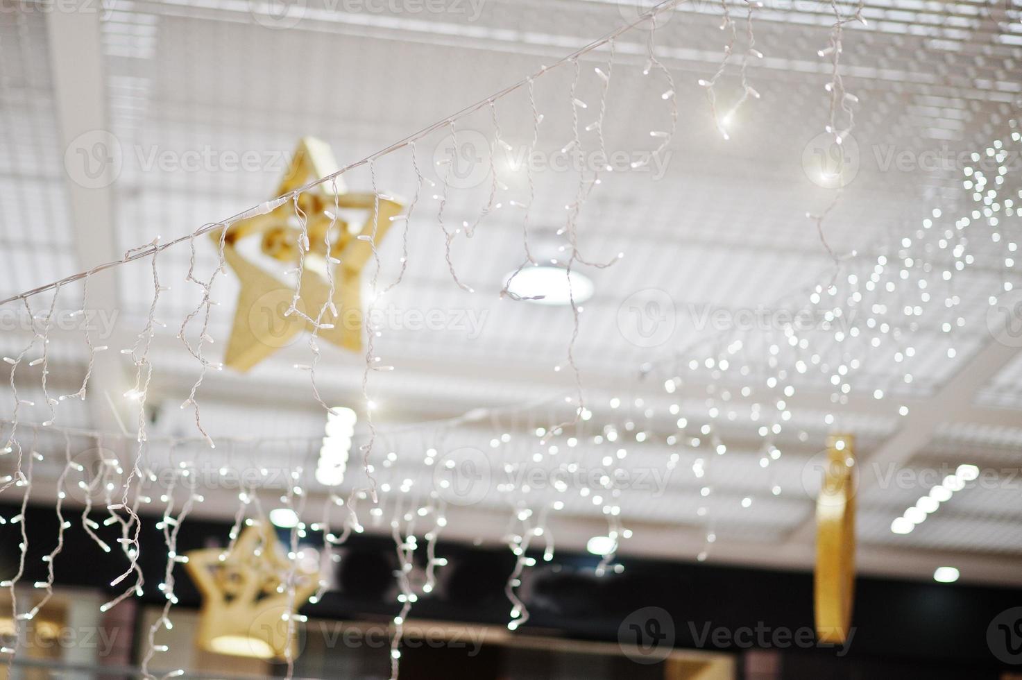 New Year scenery from white garlands decorations at shopping mall. photo