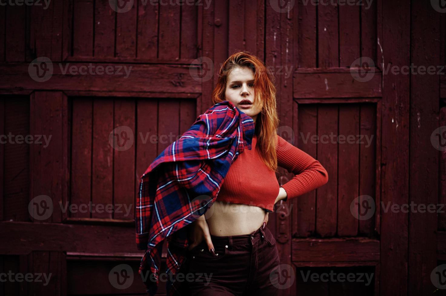 Fashion portrait of redhaired sexy girl outdoor. Model attractive seduction woman. photo