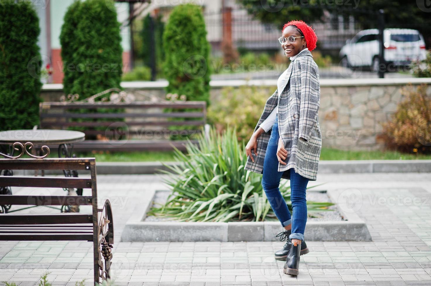 Young modern fashionable, attractive, tall and slim african muslim woman in hijab or turban head scarf posed. photo