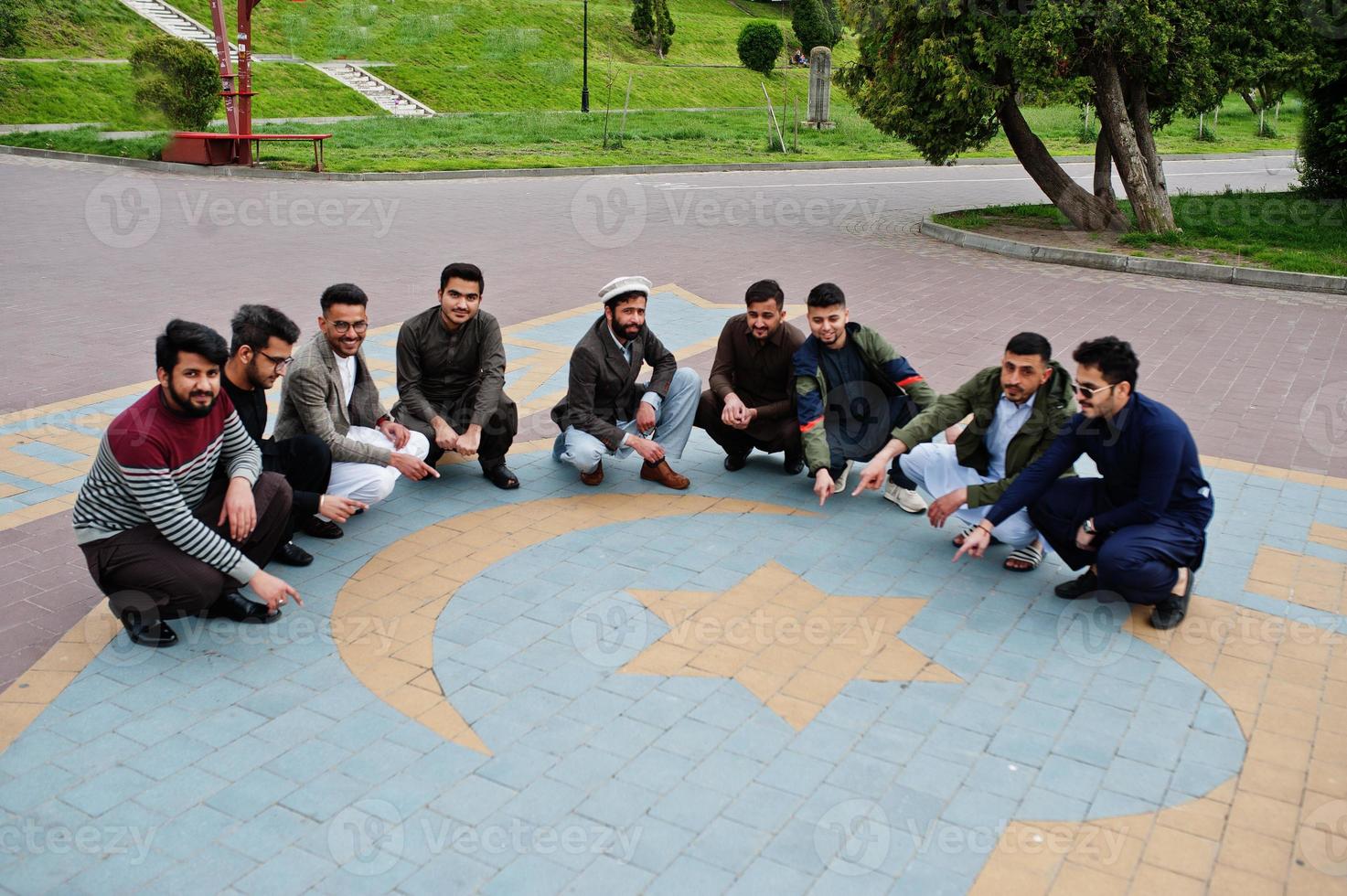 Group of pakistani man wearing traditional clothes salwar kameez or kurta. photo