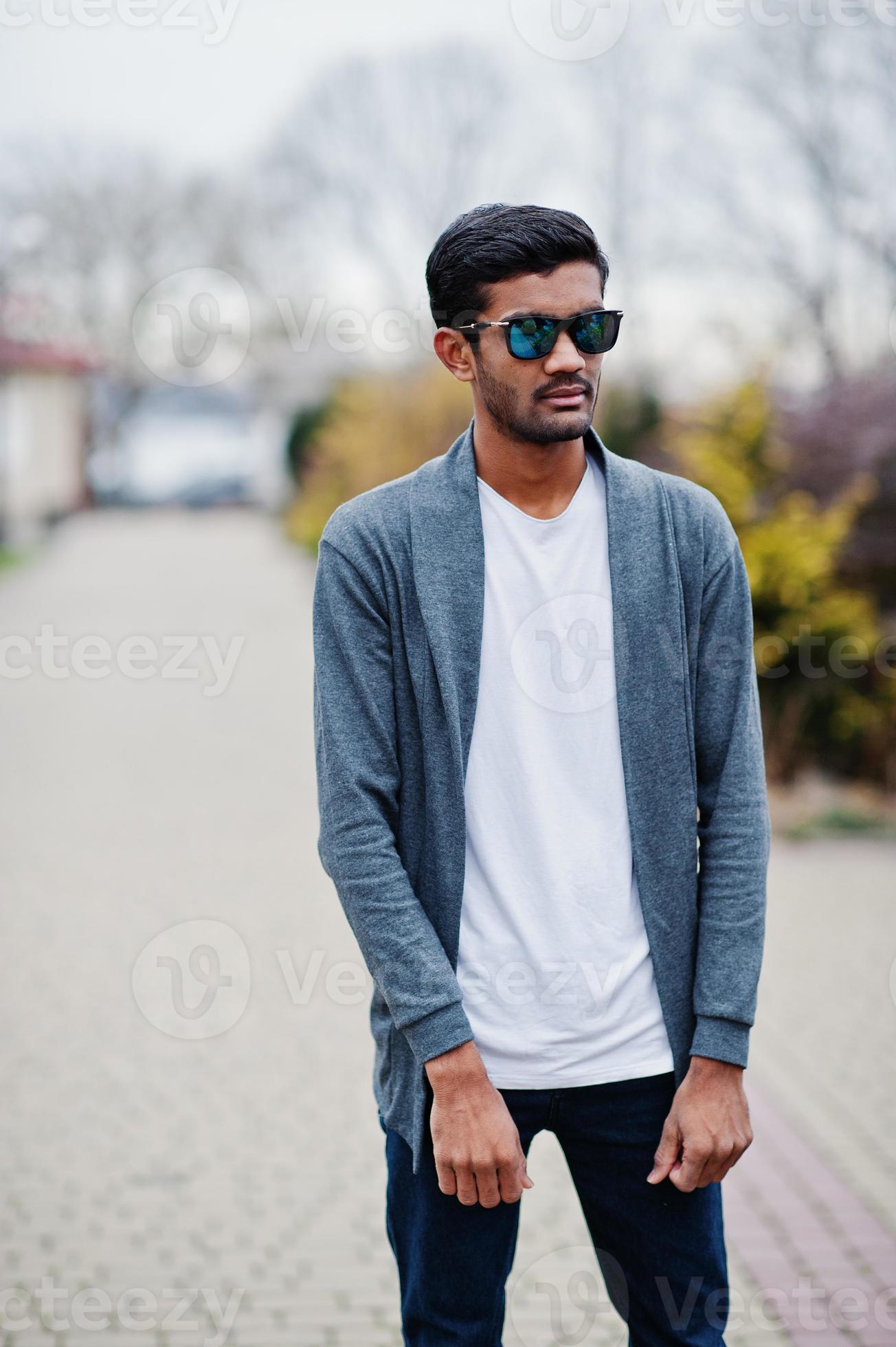 Stylish indian man at sunglasses wear casual posed outdoor. 10499886 Stock  Photo at Vecteezy