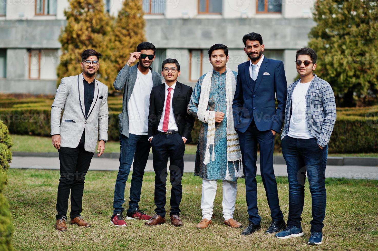 Group of six south asian indian mans in traditional, casual and business wear. photo