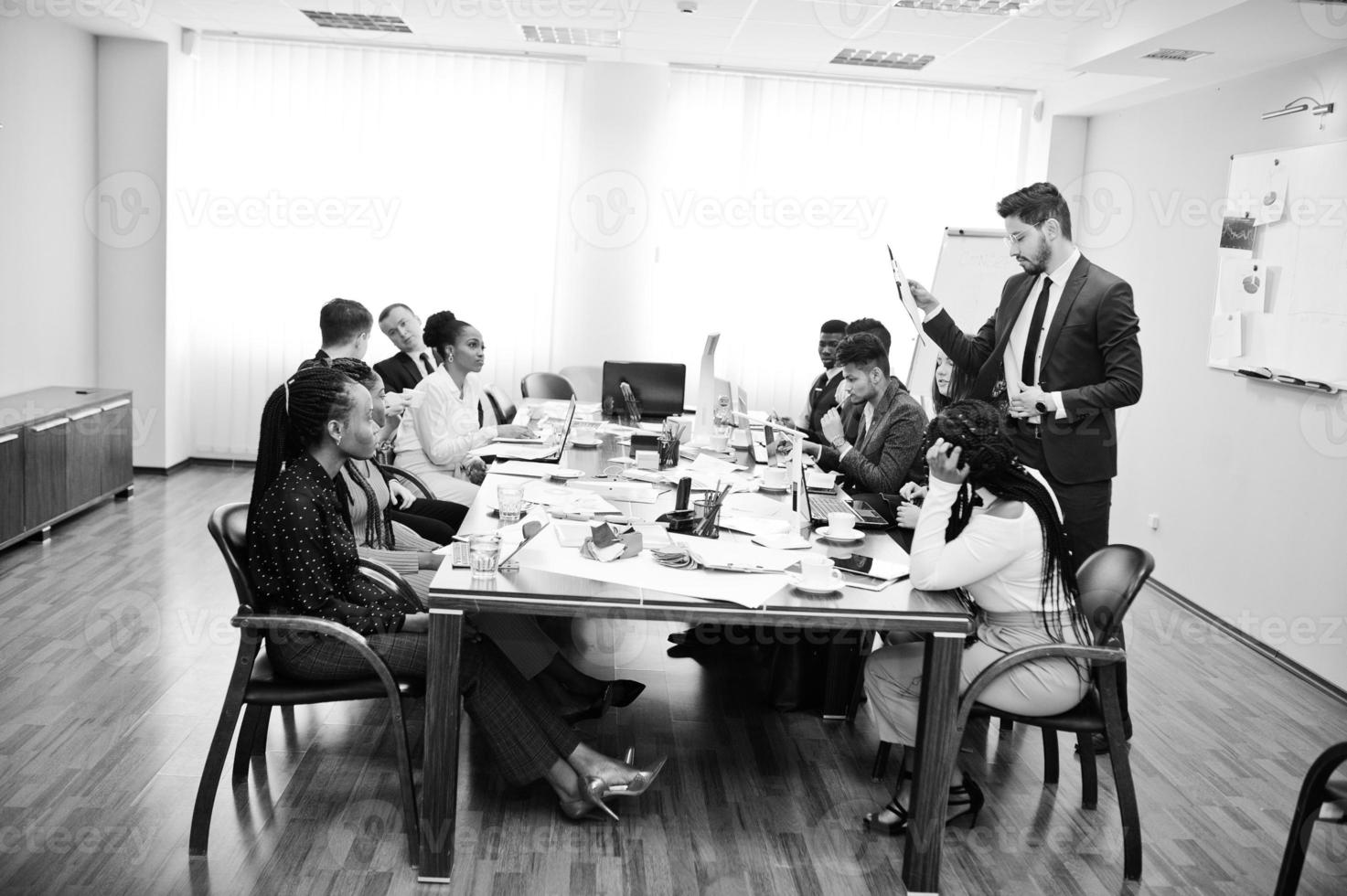 Diverse business people on a meeting at round table. photo