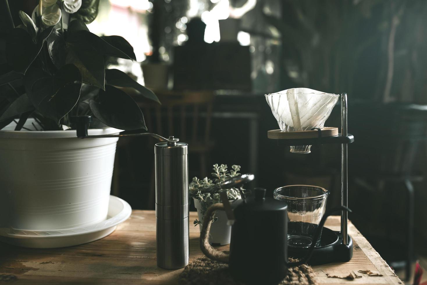 Vietnamese filtered or poured Vietnamese coffee dripping beer is a method that involves pouring water over the ground roasted coffee beans contained in a filter coffee shop in Asia. photo