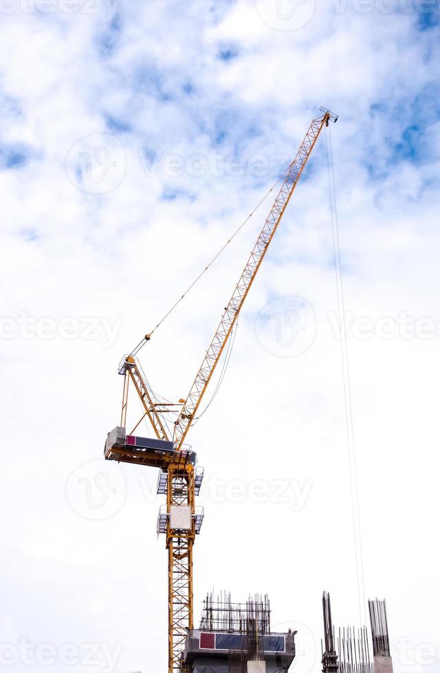 Tower crane working in construction site photo