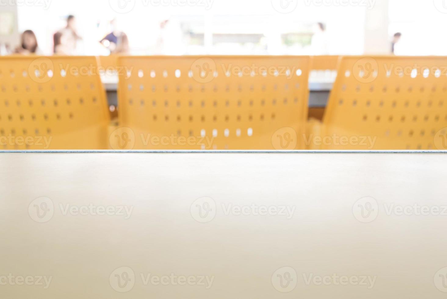 Empty tables and chairs that nobody sit in the cafeteria photo