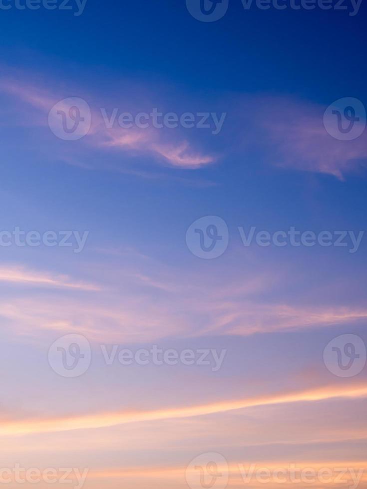 Fluffy clouds in the blue sky with morning light from the sunrise photo