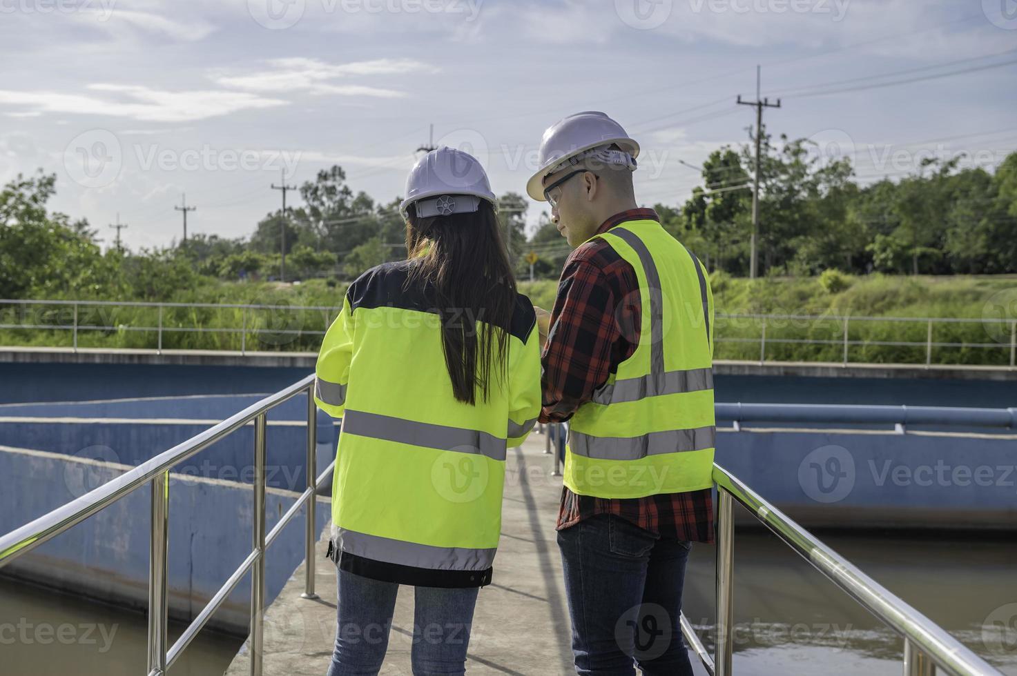 Environmental engineers work at wastewater treatment plants,Water