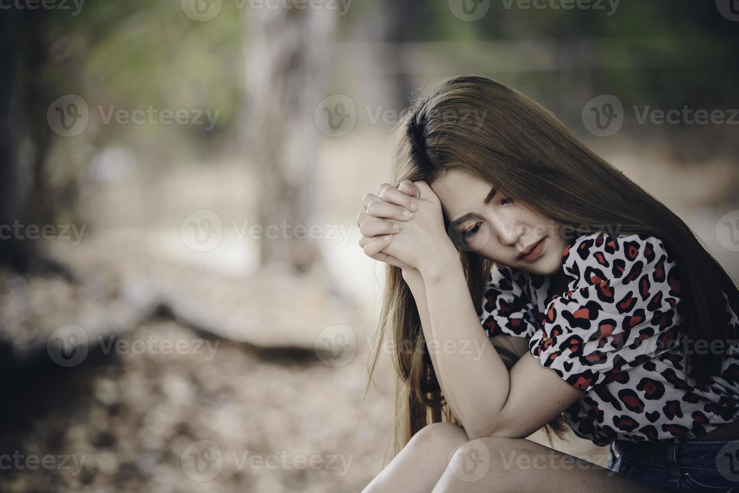 Beautiful thai woman very sad from unrequited love,rethink,think over,vintage style,dark tone,broken heart,asian girl photo