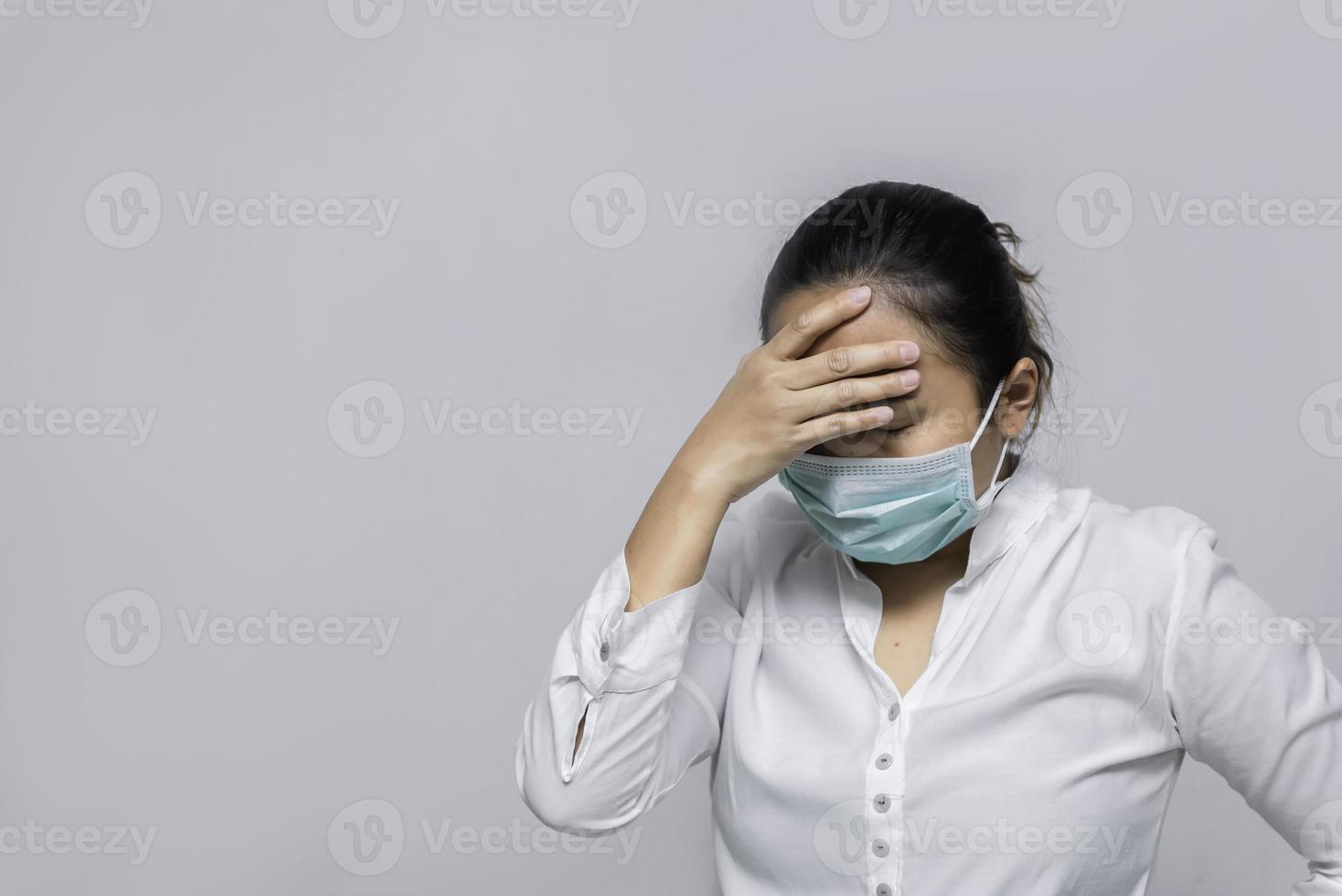 Asian woman business in city of thailand,A girl wearing protection medical mask covid-19 or coronavirus from Infected person,corona protected Help protect For world and people stop virus warning photo