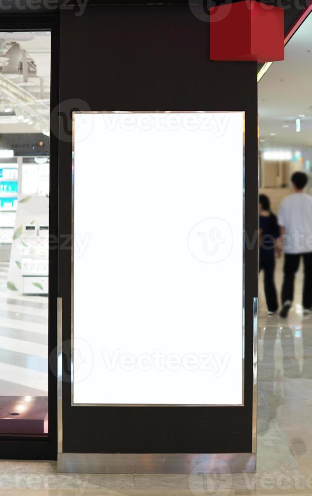 Advertising poster board inside department store photo