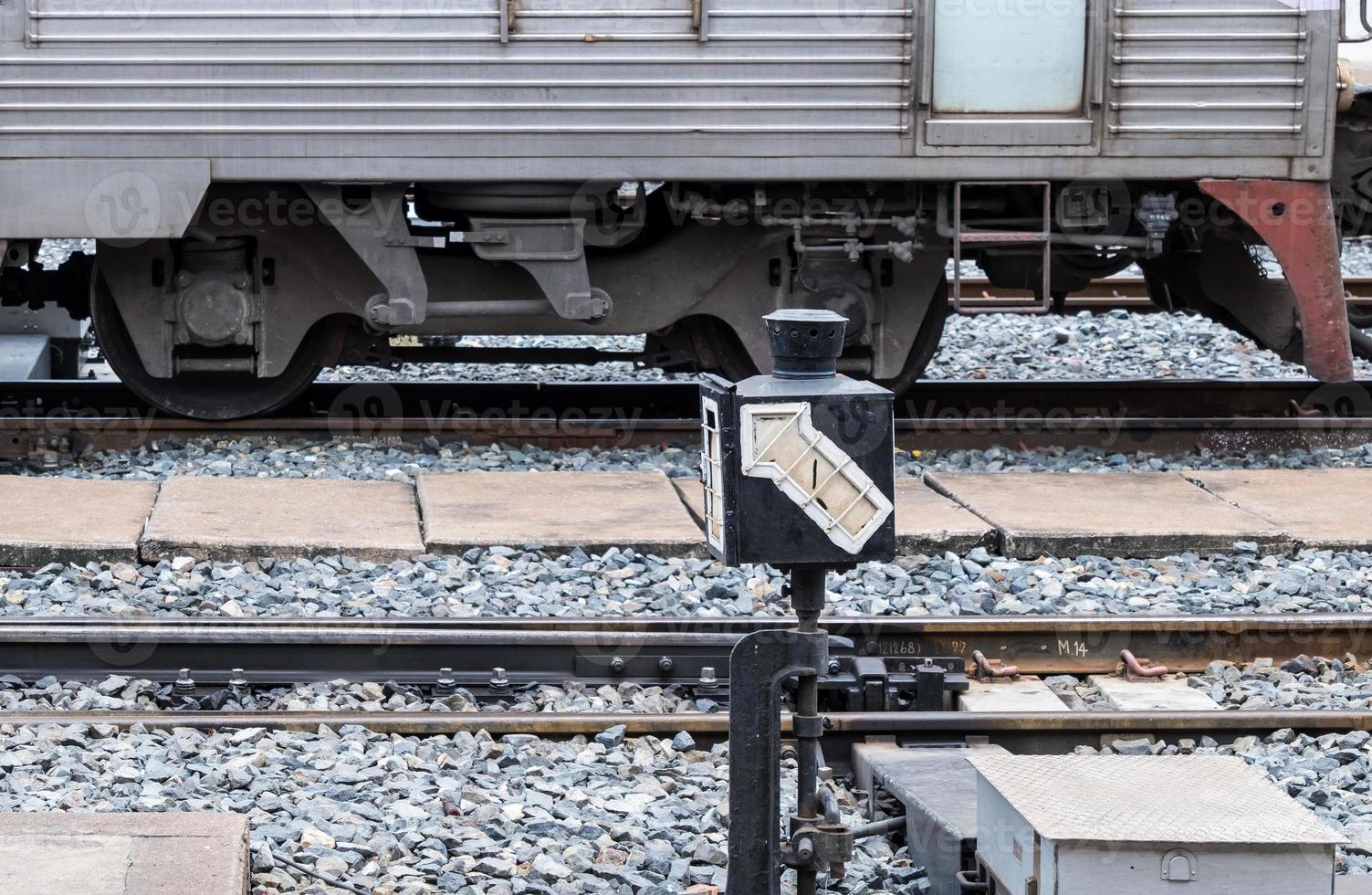 White arrow signal from the switching mechanism. photo