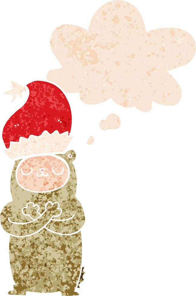 cartoon bear wearing christmas hat and thought bubble in retro textured style vector