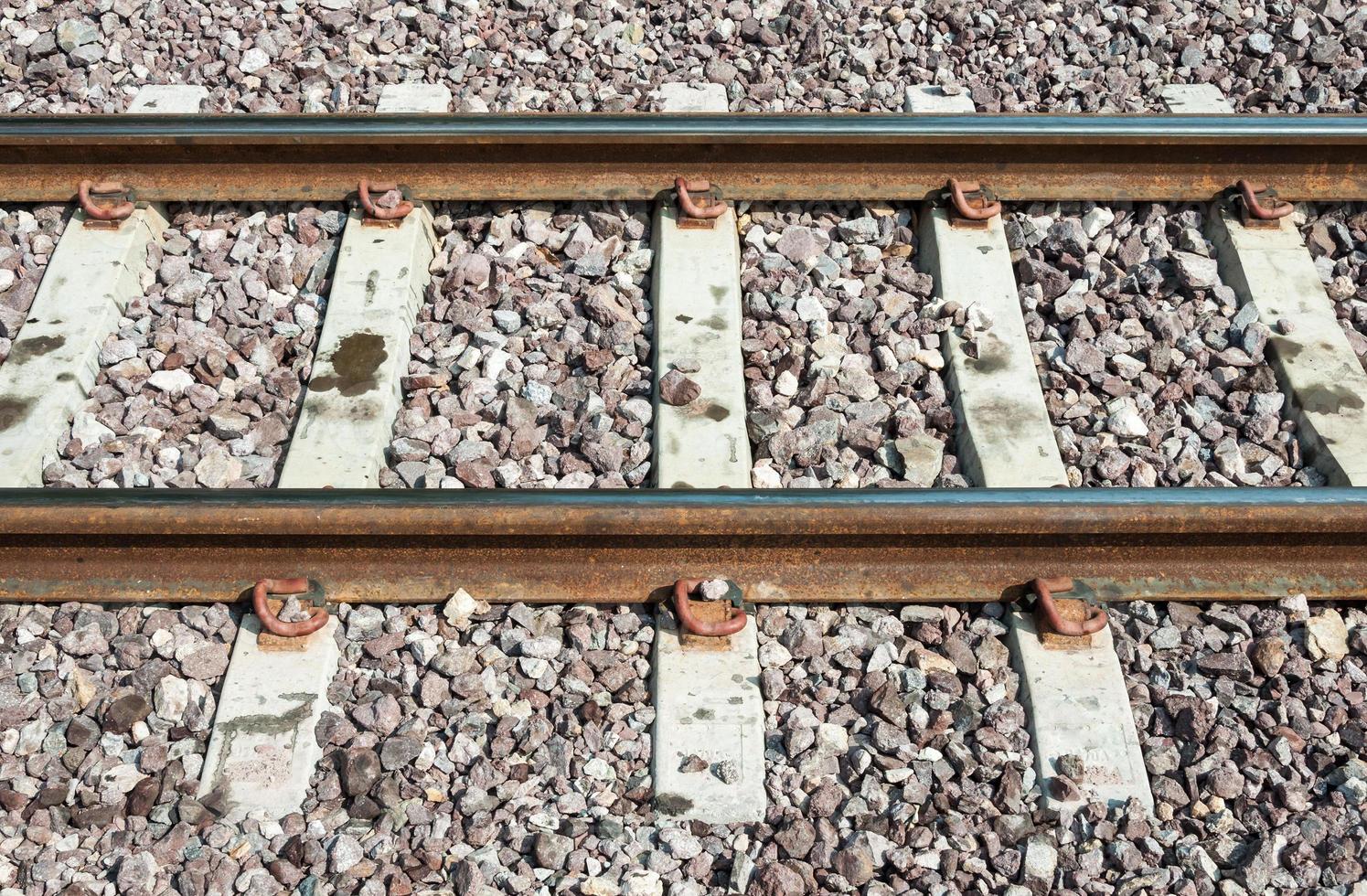 New railway track with the concrete sleeper. photo