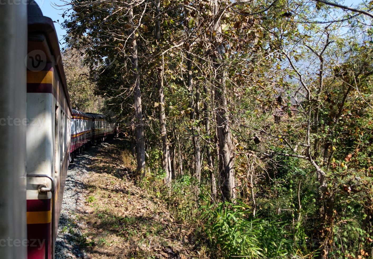 The express train is going to the hilltop  along with the mountain range. photo
