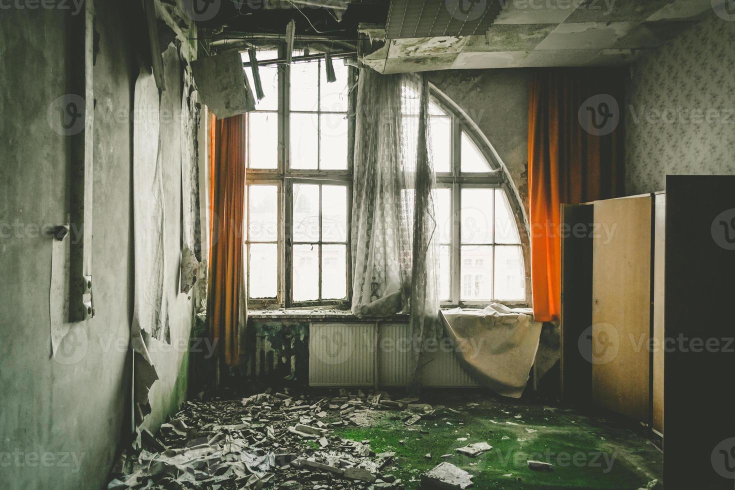 An old living room in an abandoned house photo