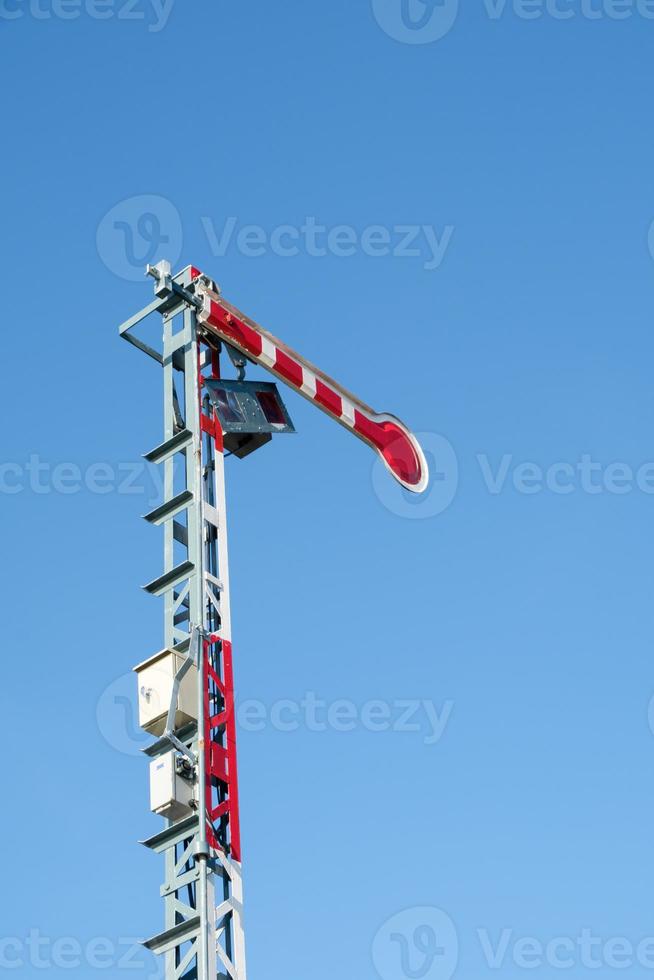 The traffic signal pole in the stop status of the railway traffic system. photo