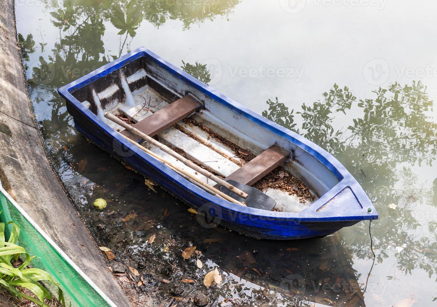 Old plastic rowboat photo