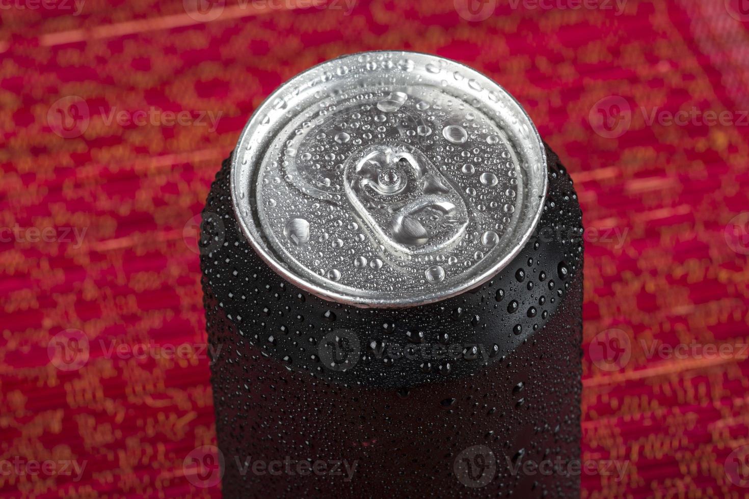 black aluminum can, with drops of water photo