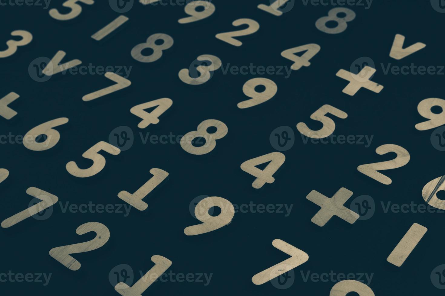 Colorful wooden colorful numbers background. Numbers texture abstraction. Global economy crisis concept photo