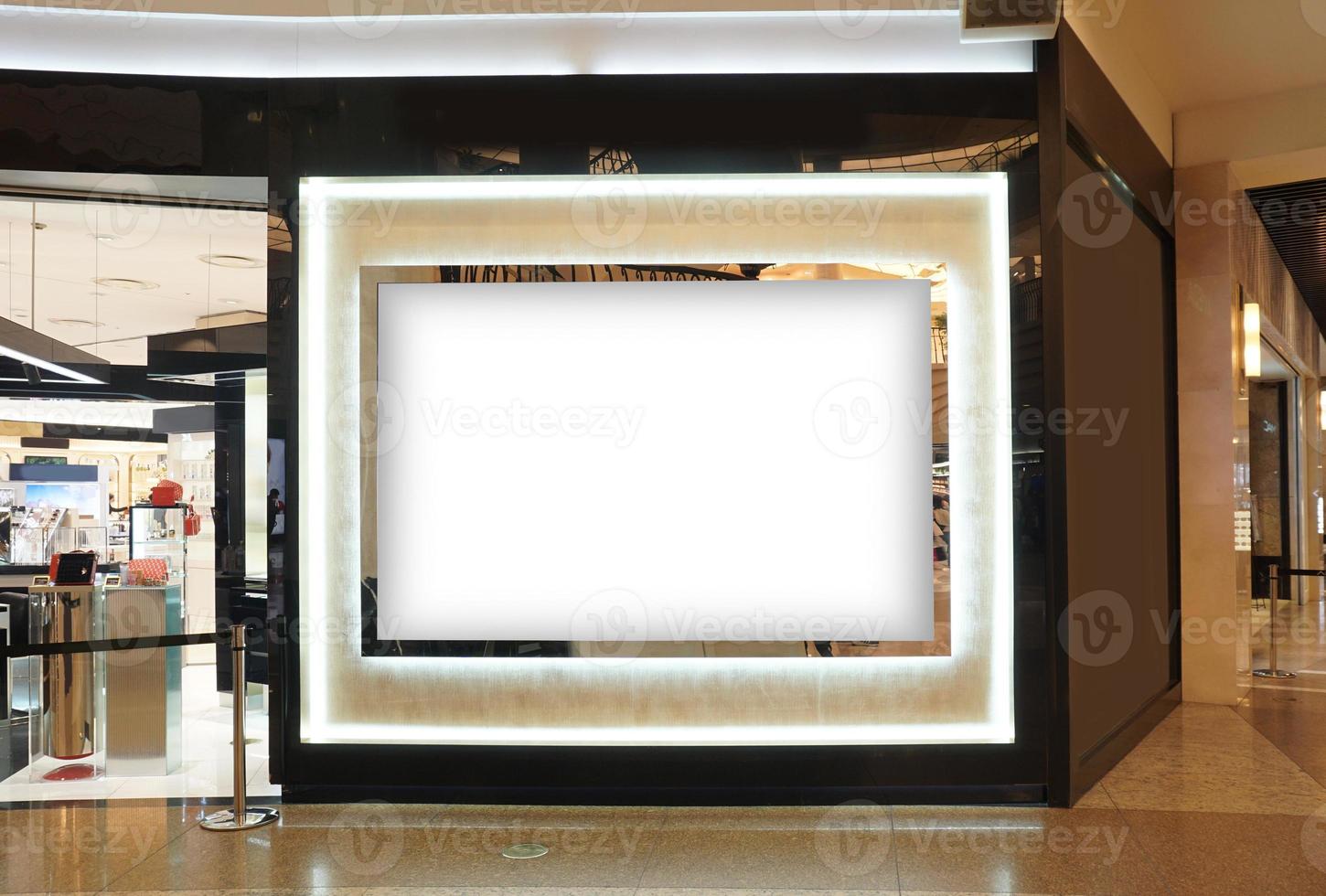 Advertising poster board inside department store photo