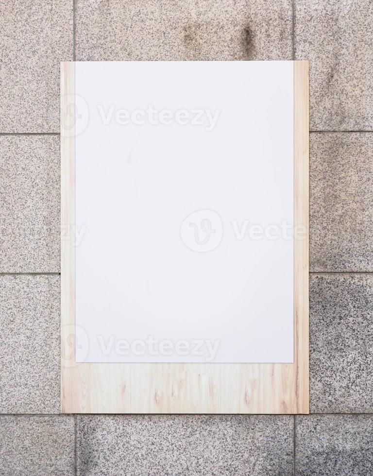 Poster wooden boards on marble walls. photo